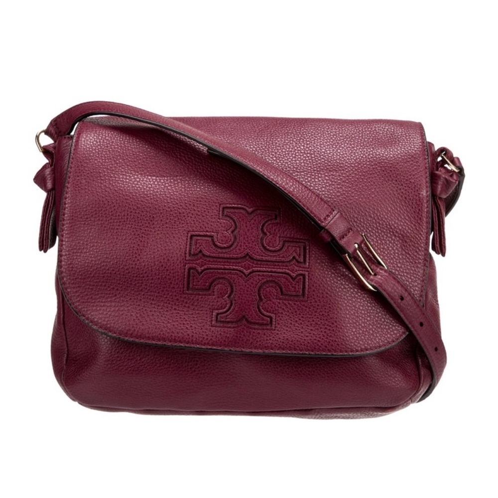 A beautiful burgundy/maroon Tory Burch cross body purse.